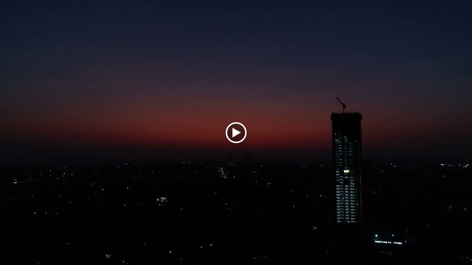 Signature under construction at dusk